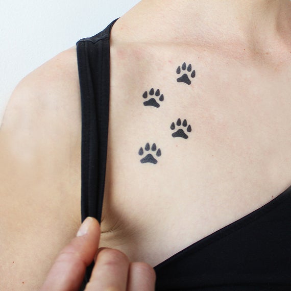 Paws All over again tattoo for girls on neck