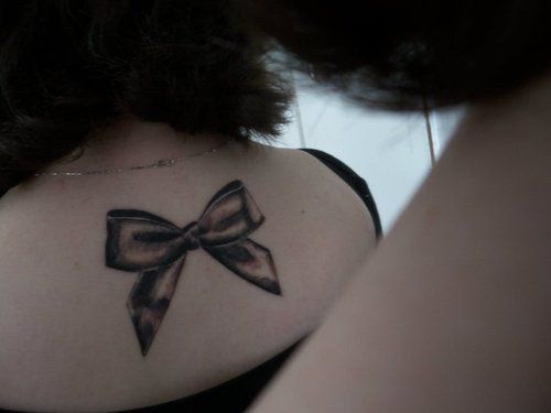 black and white bow tattoo