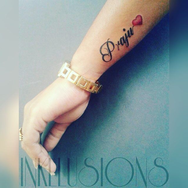 love-symbol-wrist-tattoo